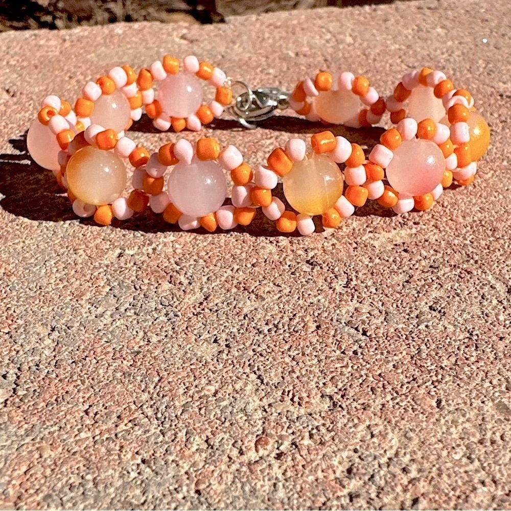 Pastel Pink and Orange Glass Beaded Bracelet with Silver Colored Accents